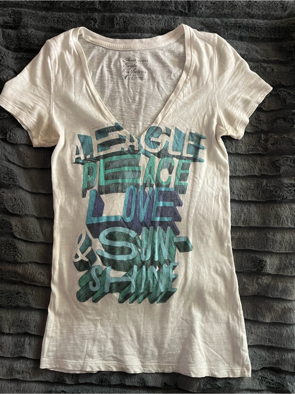 American Eagle White V-Neck Tee with Teal & Blue Graphic